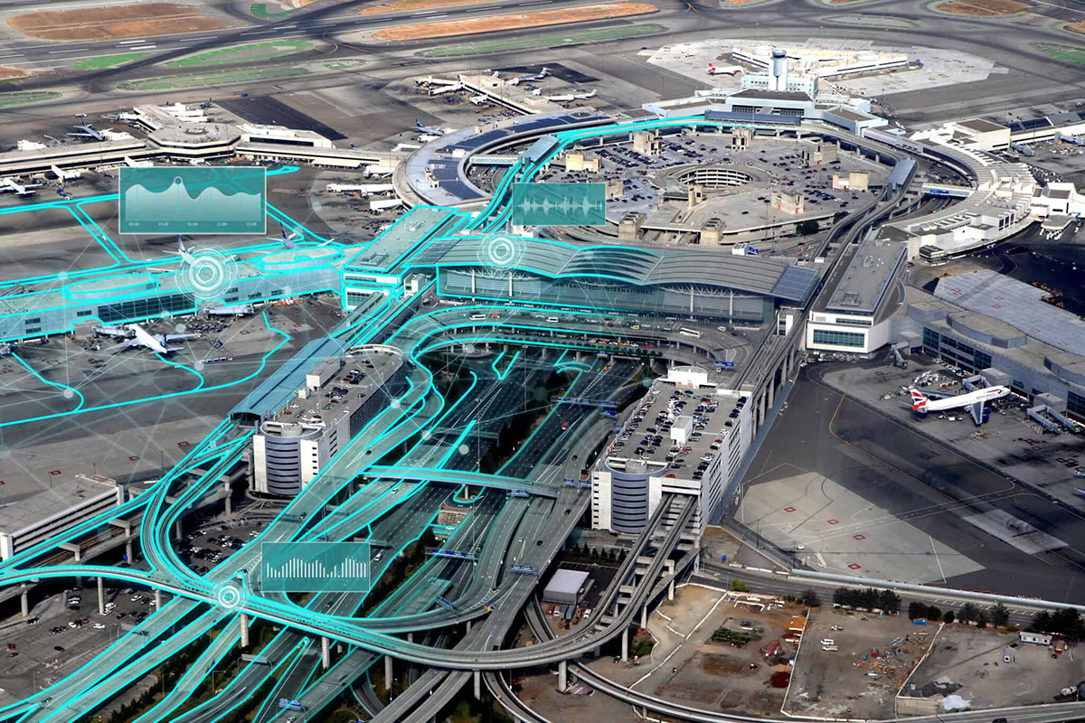 Aerial view of a large airport with terminals, runways, airplanes, and highlighted digital graphics overlaying parts of the infrastructure.