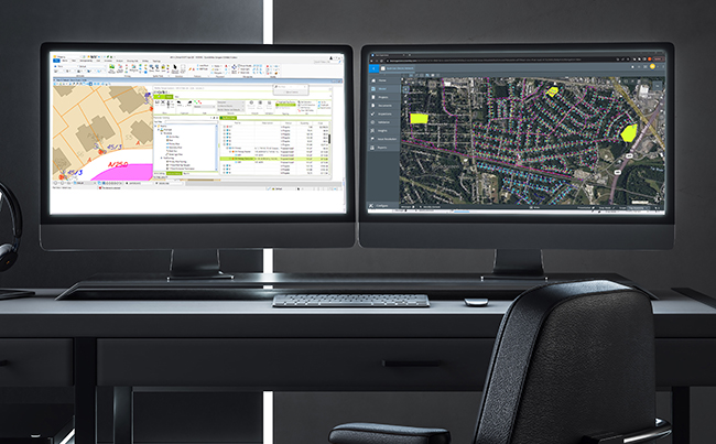 Dual-monitor setup on a desk displaying a distribution design demo and a map application.