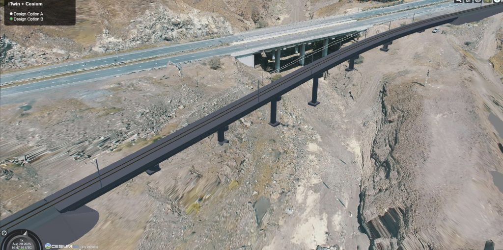 A digital rendering shows a new elevated bridge under construction next to an existing highway bridge spanning a rocky, barren landscape.