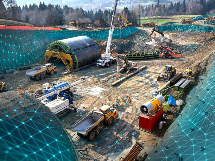 a construction site with various large construction equipment and a digital overlay of blue connected dots overlayed on the image