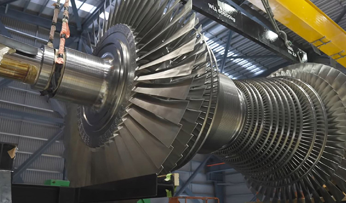 A large industrial turbine in a factory.