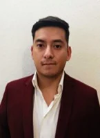 Man in a white shirt and maroon blazer against a plain background conducting a Fire Flow analysis.