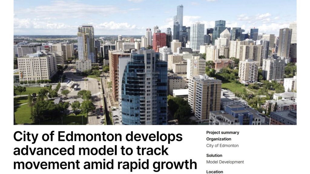 Aerial view of downtown Edmonton with high-rise buildings and streets, illustrating rapid urban growth and development enhanced by Asset Analytics and OpenPaths solutions.