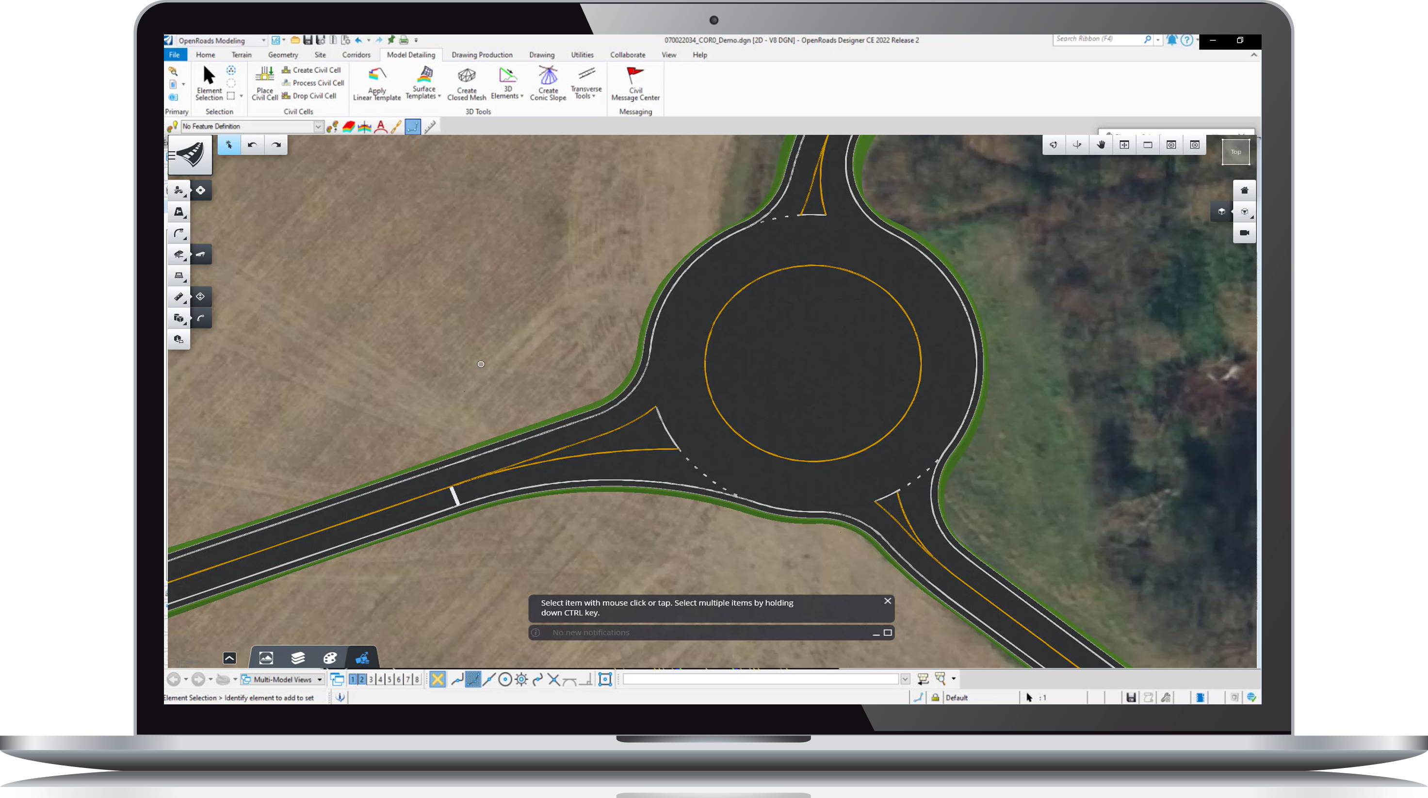 Aerial view of a roundabout displayed on a computer screen with civil worksuite software interface open.