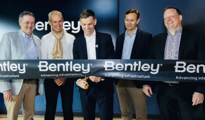 Ribbon cutting event at Bentley Systems’ new technology hub in Québec City, L to R: Carl Viel, president and CEO, Québec International; Julien Moutte, chief technology officer, Bentley Systems; Bruno Marchand, mayor of Québec City; Nicholas Cumins, CEO, Bentley Systems; and Francois Valois, senior vice president, Bentley Open Applications, Bentley Systems. Image courtesy of Bentley Systems.