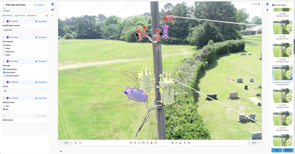 A utility pole with electrical transformers and insulators