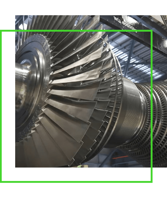 Uma imagem de um motor de turbina em uma fábrica.