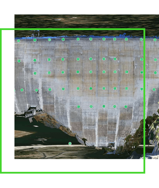 Uma imagem de uma barragem com pontos verdes.
