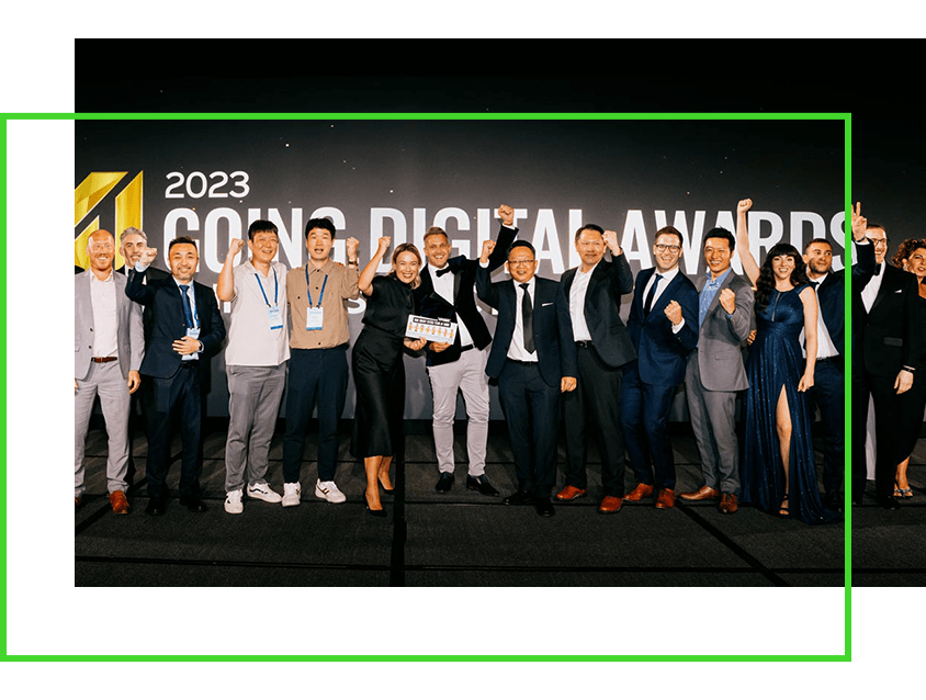 A group of people posing for a photo at the 2023 Going Digital Awards event.