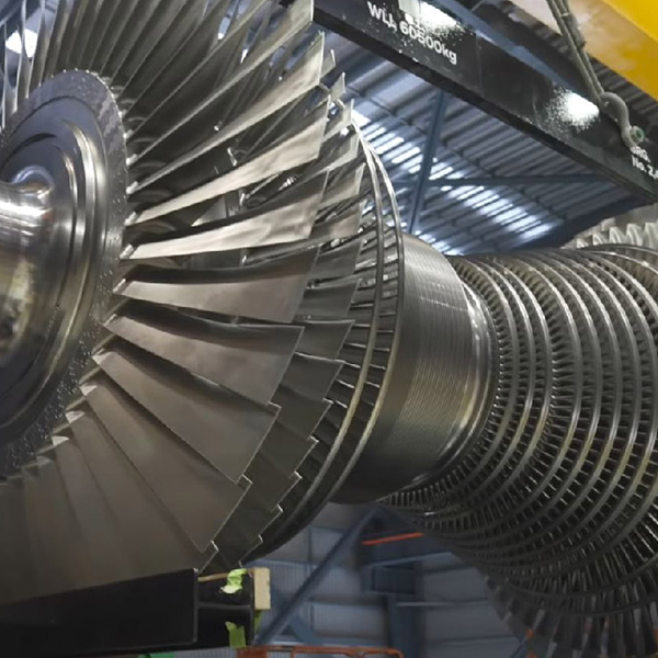 A large turbine engine in a factory.