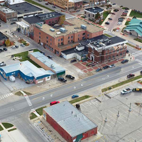 An aerial view of a street and buildings.